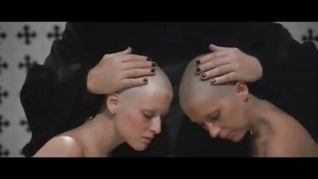 Men with heads shaved bald